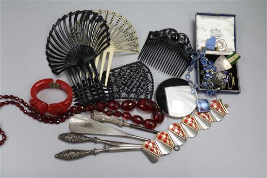 An amberoid necklace, a bakelite bangle, an Art Deco silver compact, jet and bakelite mantilla combs, silver and gold jewellery.